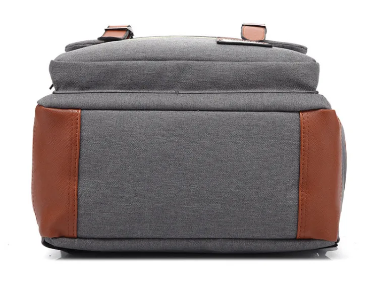 Postmodern Oxford Laptop Backpack - Sage Design Group - Annette Sage, CEO